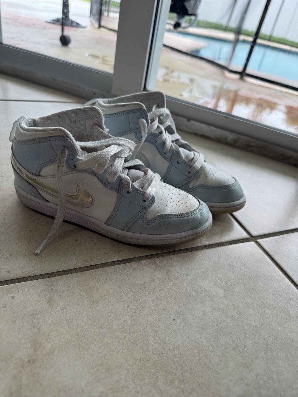 Nike Women’s Mid-Top Sneakers in White and Light Blue with Iridescent Swoosh